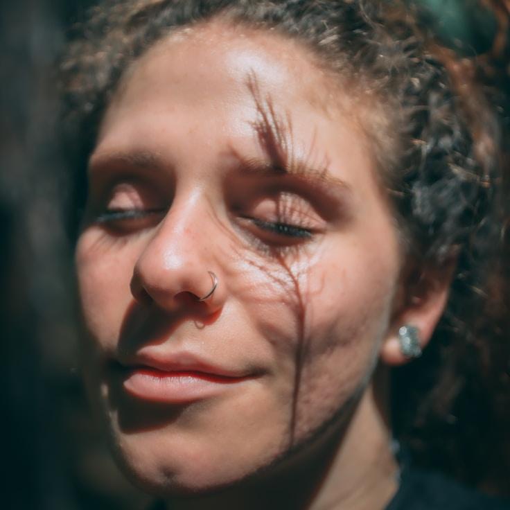 Alex Carter, Lead Design Curator at Grove Panel Cove, reviewing corporate floral arrangements